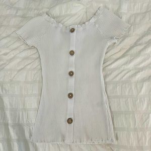 white ribbed shirt with brown buttons (buttons for accessories/ not a button up)